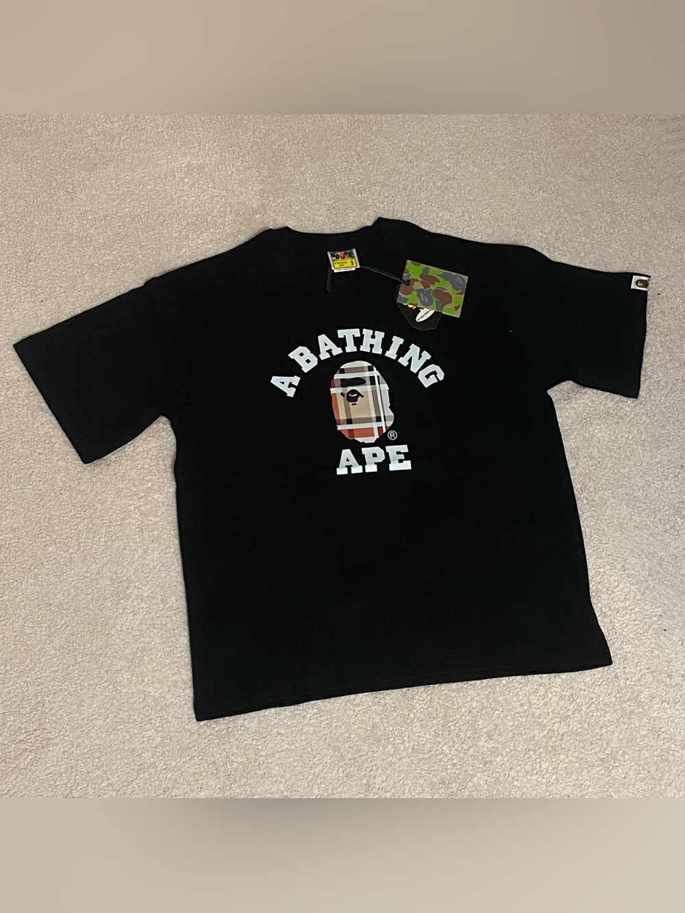 A Bathing Ape Bape Black Tee with Plaid Ape Head Logo